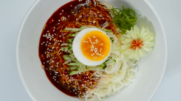 Korean Spicy Noodles Guksu Ontop Boiled Egg White Bowl Traditional — Stock Video