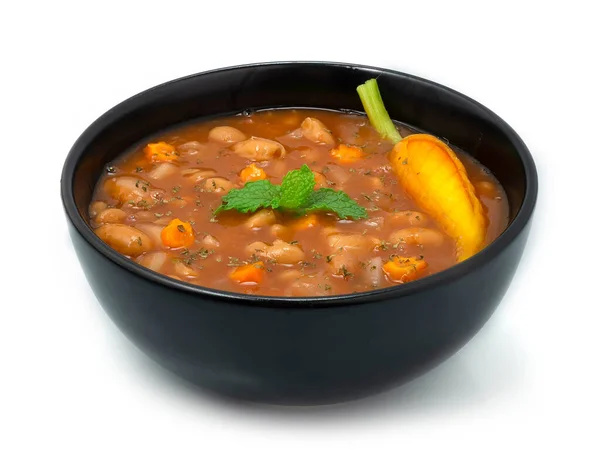 White Bean Soup for Breakfast,Lunch and Dinner Cooked like as like Moroccan Bean Vegan Stewed or Tradditional Mediterranean European Food Style decorate with Carved Carrot sideview