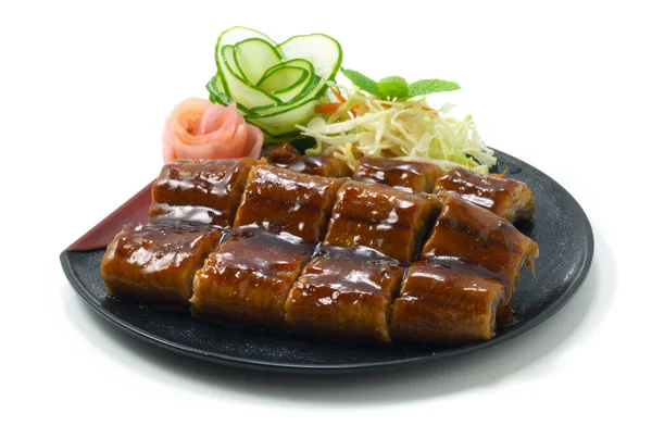 Unagi Izgara Yılanbalığı, soslu, turşulu, zencefilli, oyulmuş, sebzeli, Japon Gıda Füzyonu Stili üst görünüm. 