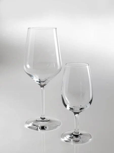 Transparent glass glasses on a white background
