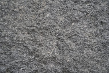 Gri granit duvarın taş yüzey dokusu