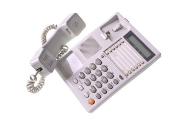 Beyaz arka planı olan eski bir Beyaz Saray telefonu. İzole edilmiş düğmeli telefon.