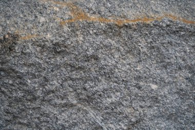 Sarı çizgili gri taş yüzey dokusu, grunge taş duvar arka planı