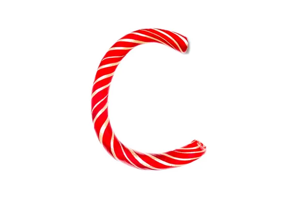 Písmeno C z červené cukrové třtiny. Slavnostní písmo C izolované na bílém — Stock fotografie