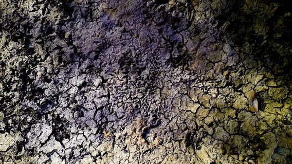 Çatlak ya da parçalanmış karalar korkunç arka plan ya da doku