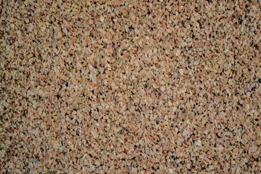 Doğal mantar tahtası, soyut kahverengi desenli arkaplan.