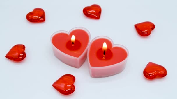 Blurred Frame Becomes Clear Two Bright Red Heart Shaped Candles — Stock Video