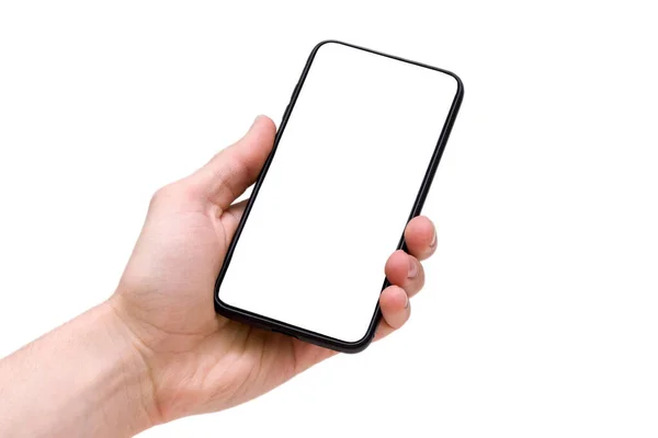 Hombre sosteniendo teléfono inteligente con pantalla en blanco sobre fondo blanco, primer plano de la mano. Espacio para texto — Foto de Stock