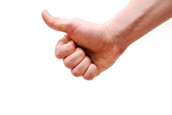 Ręka autostopowicza pokazuje kciuki - znak w górę gestem podróżnika próbującego zatrzymać samochód, odizolowany na białym tle — Zdjęcie stockowe