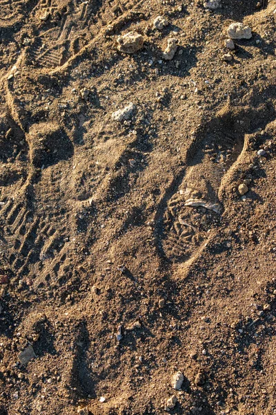 Textura Arena Piedras Que Hay Una Huella Zapatos Personas Con —  Fotos de Stock