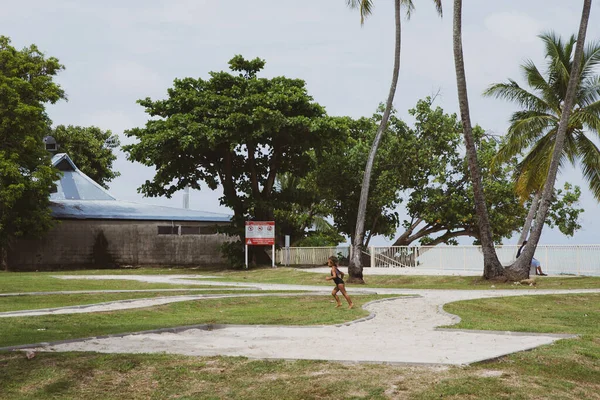 Daily life and nature live together in Moorea, French Polynesia, Everywhere there are green mountains and paradise beaches around with a blue sea, and the local people have a simple island life, living as fishermen and farmers.