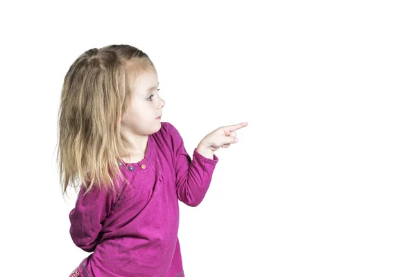El niño señala con el dedo hacia los lados — Foto de Stock