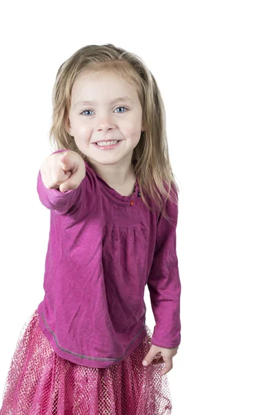 Alegre niña señala con un dedo — Foto de Stock