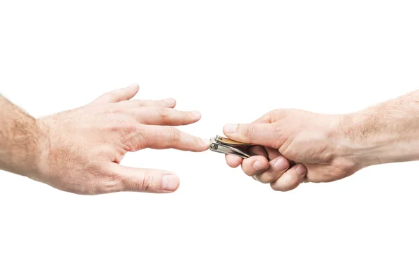 Cutting nails with a clipper — Stock Photo, Image