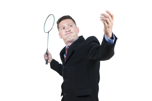 Businessman in suit playing tennis — Stock Photo, Image