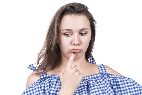 Nachdenkliches Mädchen mit aufgeblasenen Lippen — Stockfoto