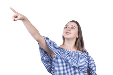 Kadın bluzu beyaz bir arka plan üzerinde izole onun parmak yana ve yukarı doğru işaret bir kafes içinde