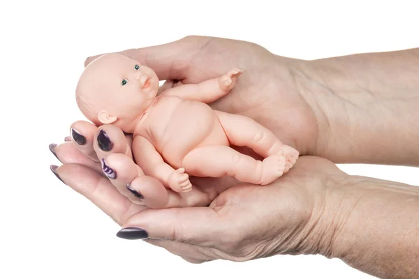 Mãos Velhas Segurar Suas Palmas Uma Pequena Boneca Isolada Fundo — Fotografia de Stock