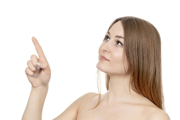 Naked woman points to the side — Stock Photo, Image