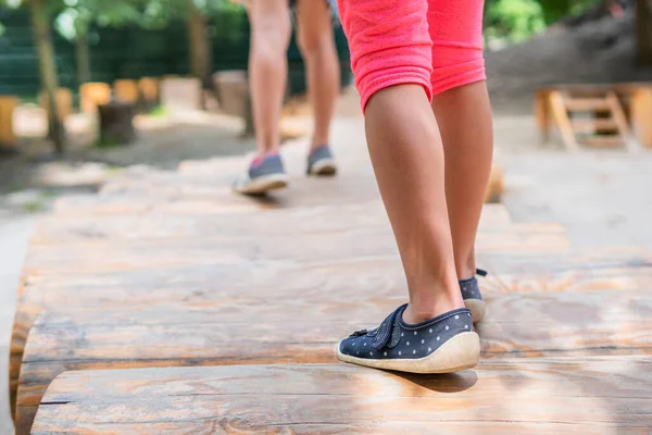 Children Feet Walk Logs Playground View Back Close — Stock Photo, Image