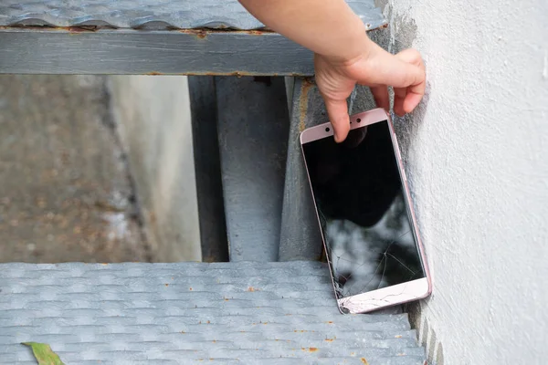 Phone fell on the steps — Stock Photo, Image