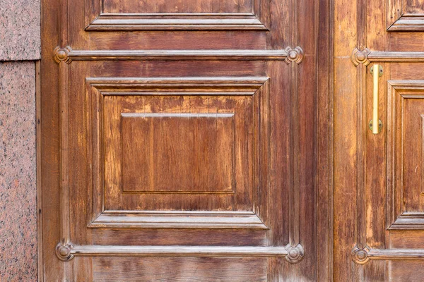 Wooden door with a sharp texture and lines. High-quality photo