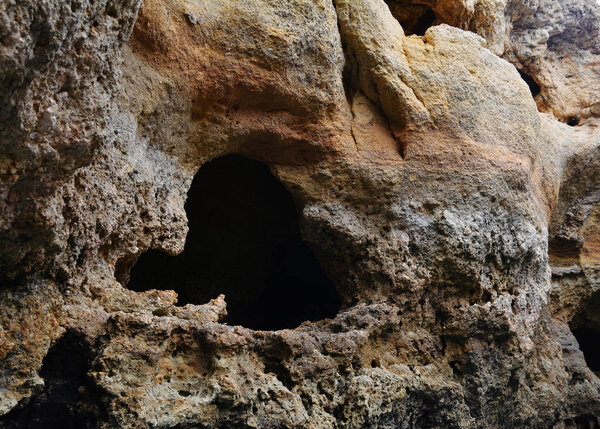 The interior of a sea cave on the Algarve coast near Benagil, Portugal, Europe. Nature geology seen from boat trip