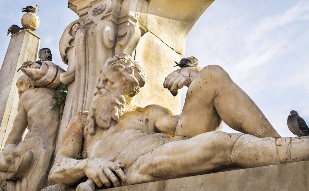 The Fontana del Sebeto , monumental fountain in Mergellina ,on the Mediterranean coast of Naples, Italy. 