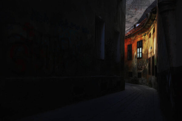 BRASOV, ROMANIA - MAY, 2018. Alecu Russo Street , unique atmosphere and amazing old colorful narrow street in the center of Brasov, beautiful city in Romania.