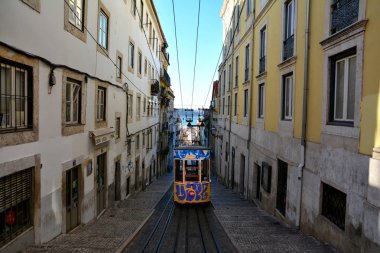 LISBON, PORTUGAL - OCTOBER 2017. Gloria lift elevator , old attraction in Lisbon, Portugal. clipart