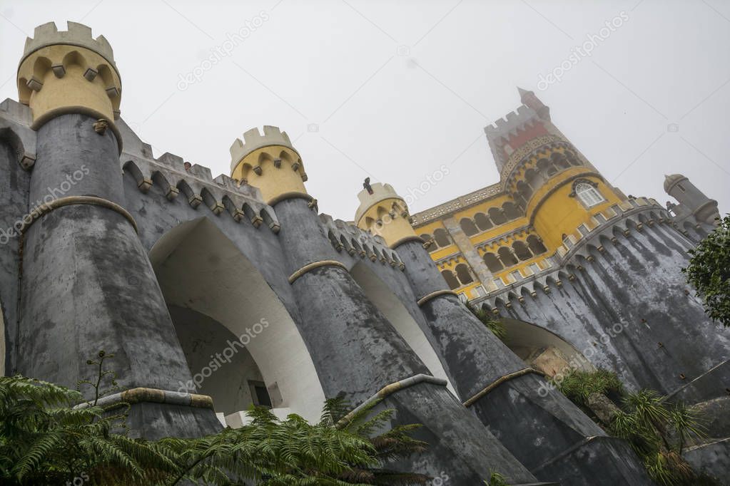SINTRA, PORTUGAL - NOVEMBER 4, 2017. Pena Palace , romanticist castle in a foggy autumn day at Sintra , Portugal. Close up.  