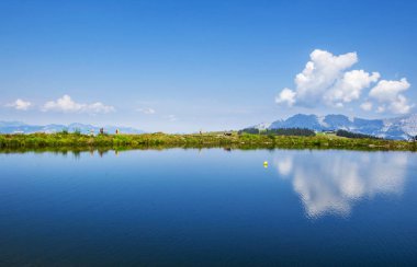 Hintersteinersee mountain lake, summer wellness attraction in Scheffau am Wilden Kaiser, Tirol, Austria