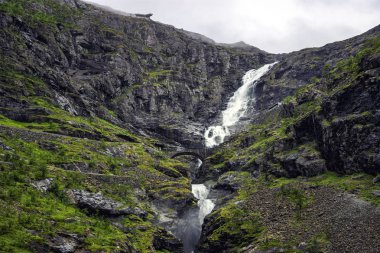 Waterfall and bridge on the Norwegian Scenic Route Geiranger - Trollstigen in Sunnmore region, More og Romsdal, Norway.