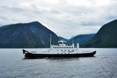 Amazing blue landscape and Fjord1 ferry transportation on Dalsfjord in Norway.