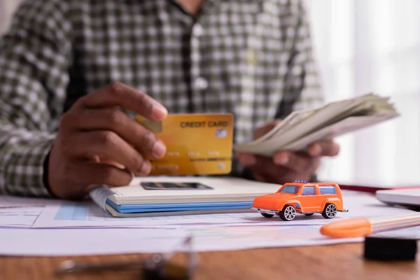 concept of pay cash, credit card for buy, rent a car.