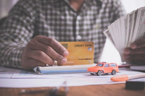 concept of pay cash, credit card for buy, rent a car.