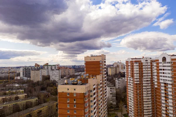 Panoramic urban view with houses and roads taken from a quadrocopter