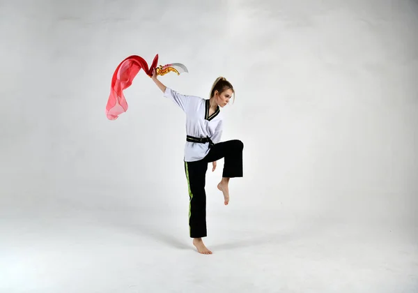 Beautiful Girl White Black Suit Does Exercises Golden Battle Swords — Stock Photo, Image