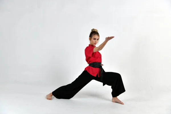 Beautiful Girl Red Black Suit Does Exercises Style Fighting Speed — Stock Photo, Image