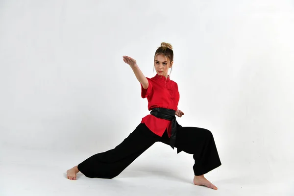 Beautiful Girl Red Black Suit Does Exercises Style Fighting Speed — Stock Photo, Image