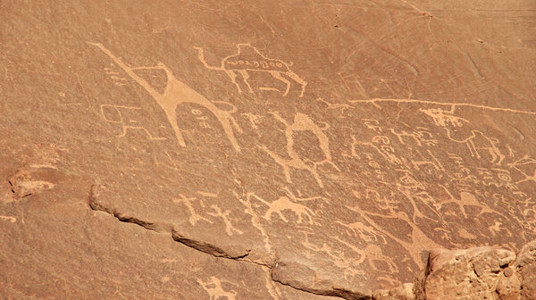 ancient petroglyphs on rocks in the red desert wadi rum at the intersection of trade routesSONY DSC