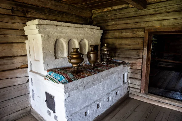 the interior of an old house with old household items of the peoples of the north