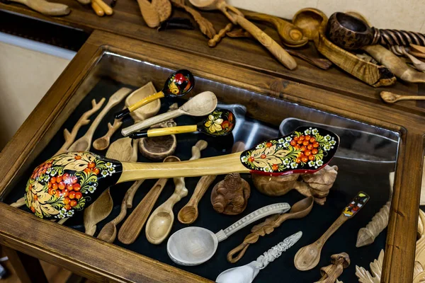 collection of antiques of different sizes from different materials from different countries-spoons