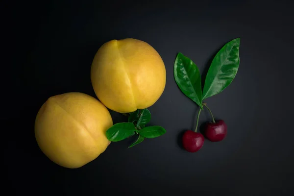 Yellow Peach Cherry Black Background — Stock Photo, Image