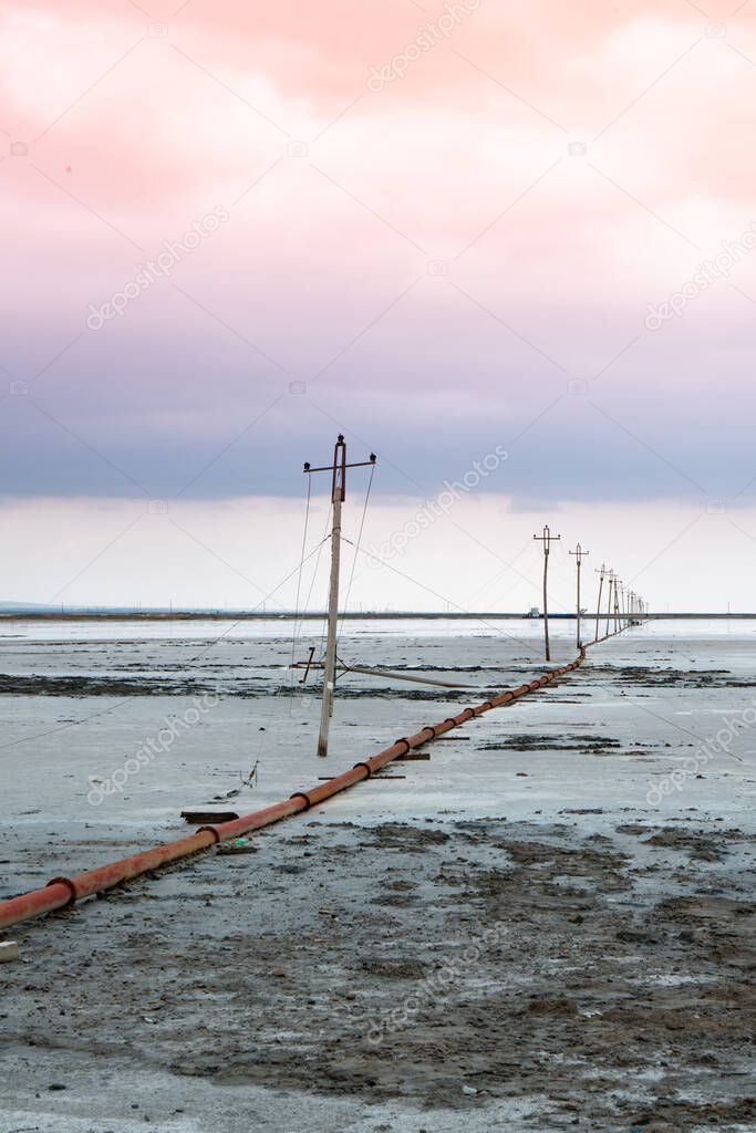 Telephone pole on Chaka Salt Lake.Caka Salt Lake in Qinghai, China.Chaka Salt Lake in Qinghai, China. Qinghai's Chaka Salt Lake is full of fantasy scenery.