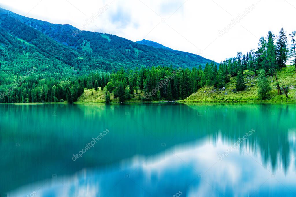 Summer in Kanas Lake, Altay, Xinjiang, China.Beautiful and quiet in summer in Kanas Lake, Xinjiang, China