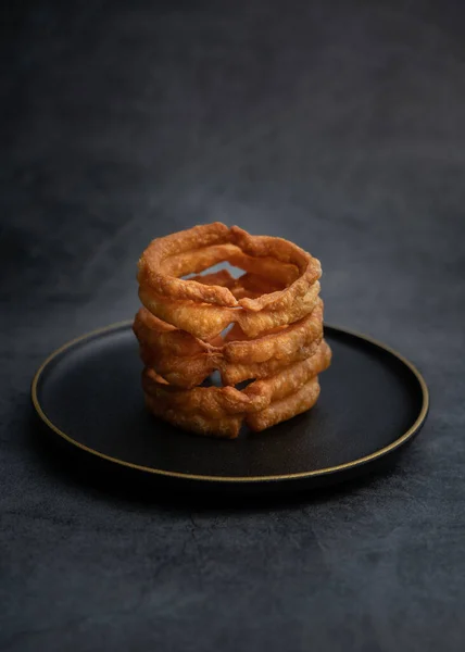 Traditional food jiaoquan in old Beijing of China. Old Beijing specialty food jiaoquan. Fried doughnut, a traditional snack in Beijing.