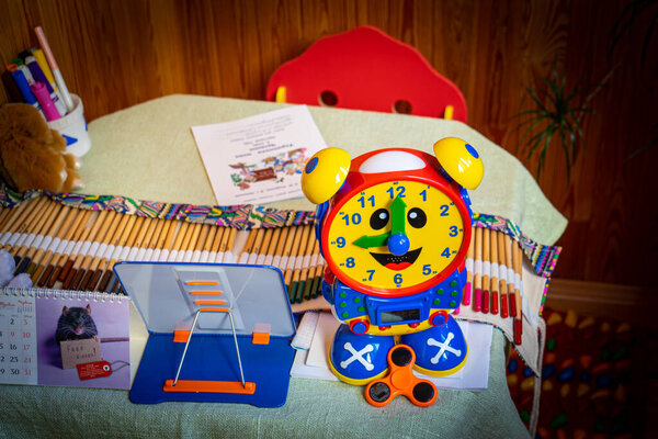 KYIV, UKRAINE - April 5,2020: Kid's corner in the balcony for doing home tasks remotely during coronavirus quarantine in Kyiv, Ukraine on April 5, 2020. Covid-19 pandemic.