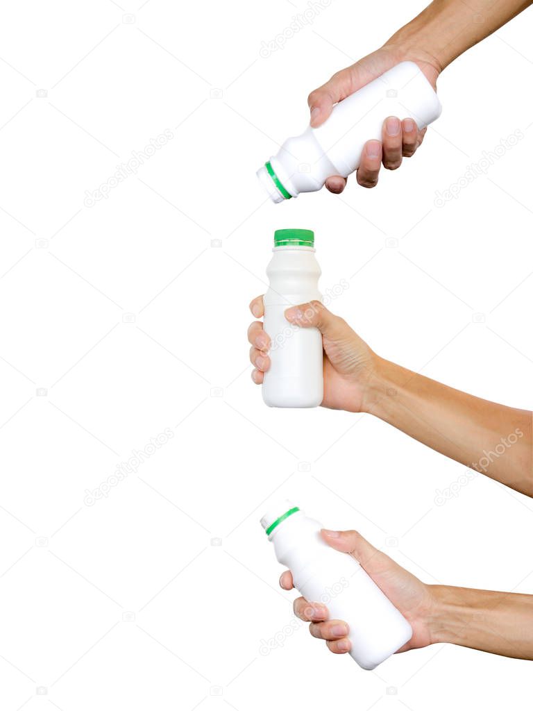 Three of Hand holding white bottle with green lid isolated on white background. Clipping path
