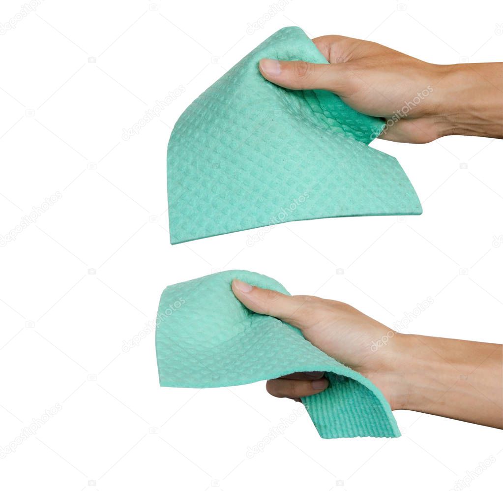 Hand holding green microfiber chamois isolated on white background. Clipping path. Microfiber use for cleaning. Multi Purpose Cloth. Hand hold green cloth.